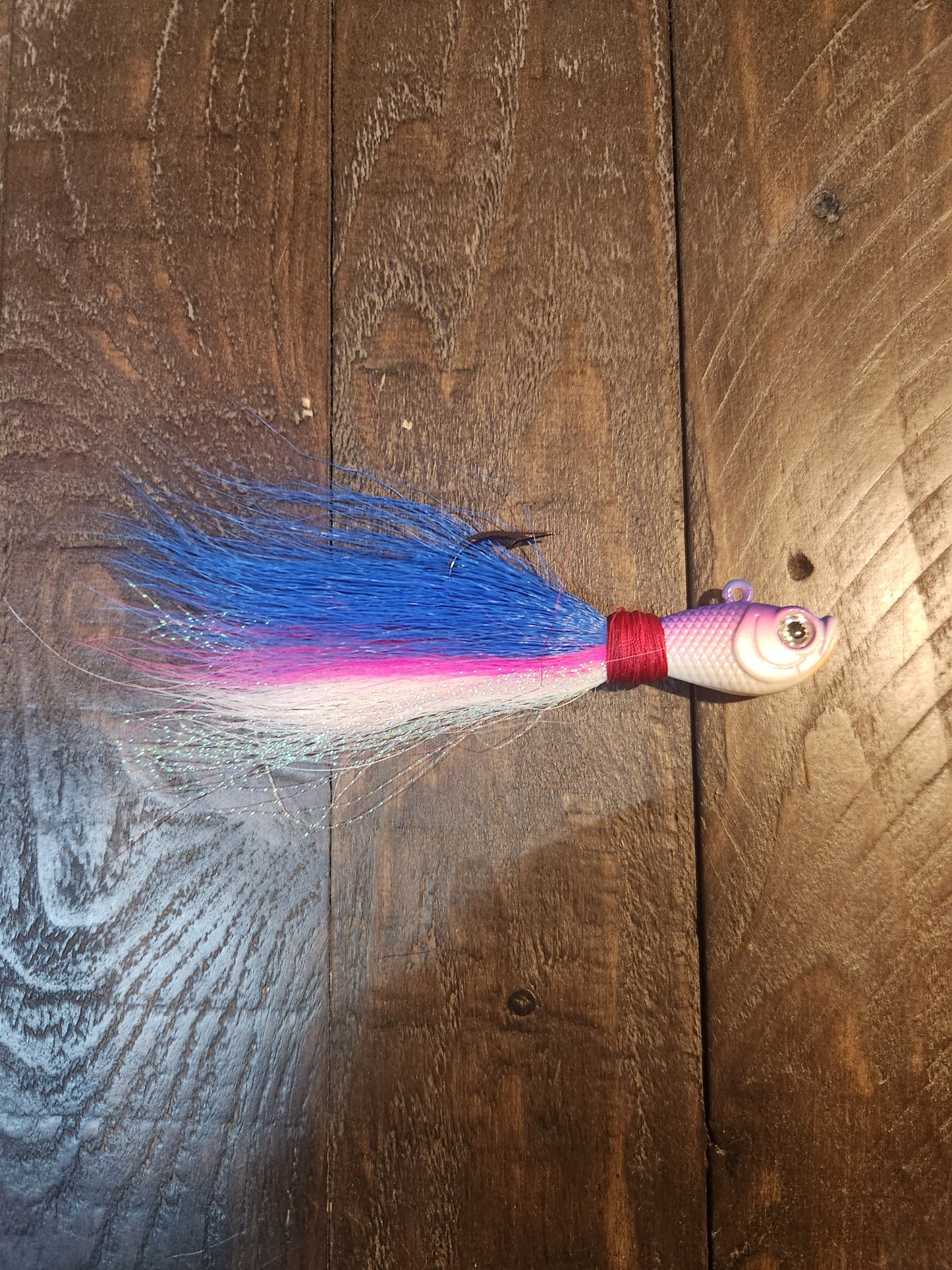 Bucktail jig, 30g, pink/blue/white, pink/white face. $5.99