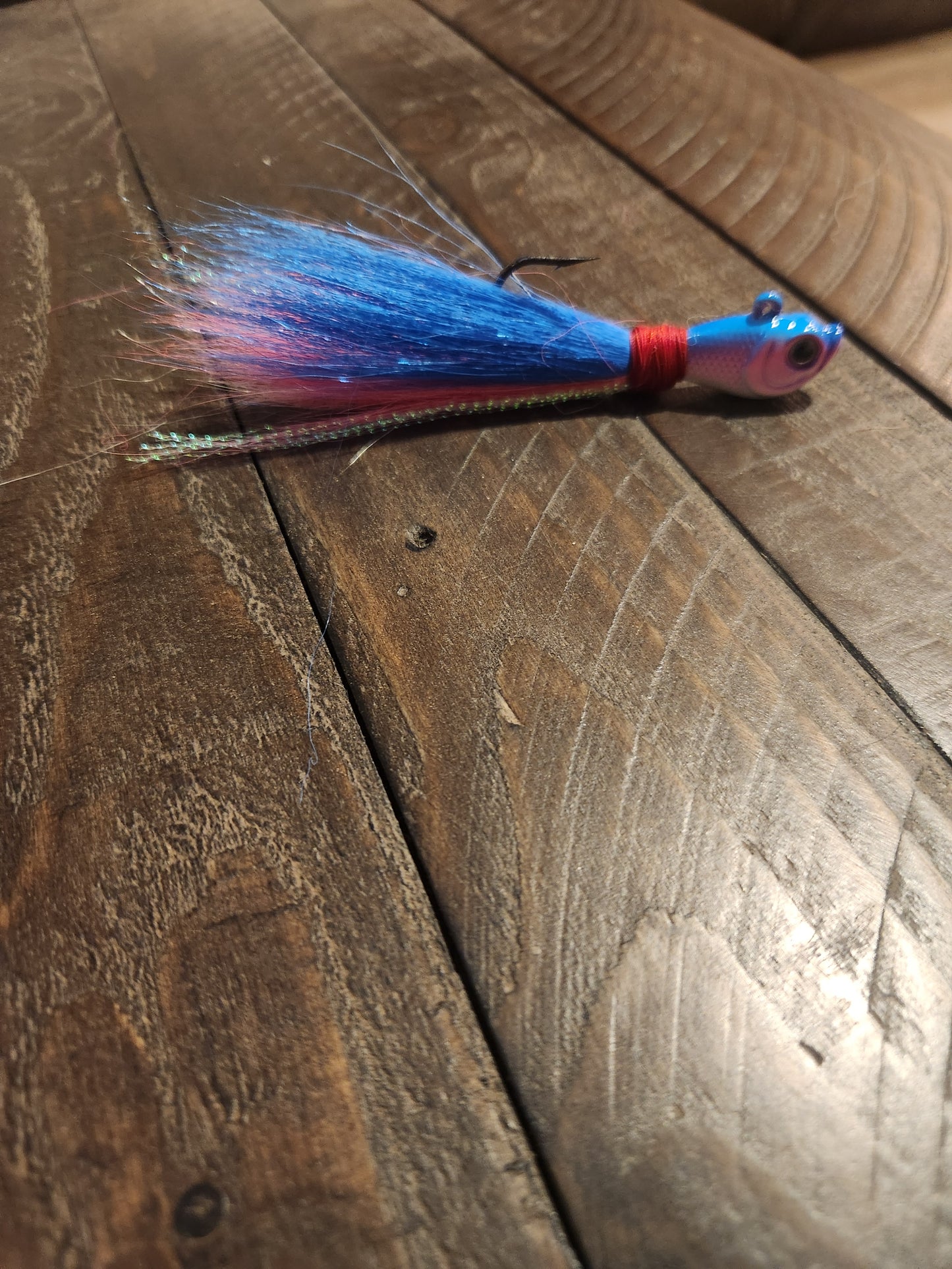 Bucktail jig, 30g, pink/blue/white, pink/white face. $5.99